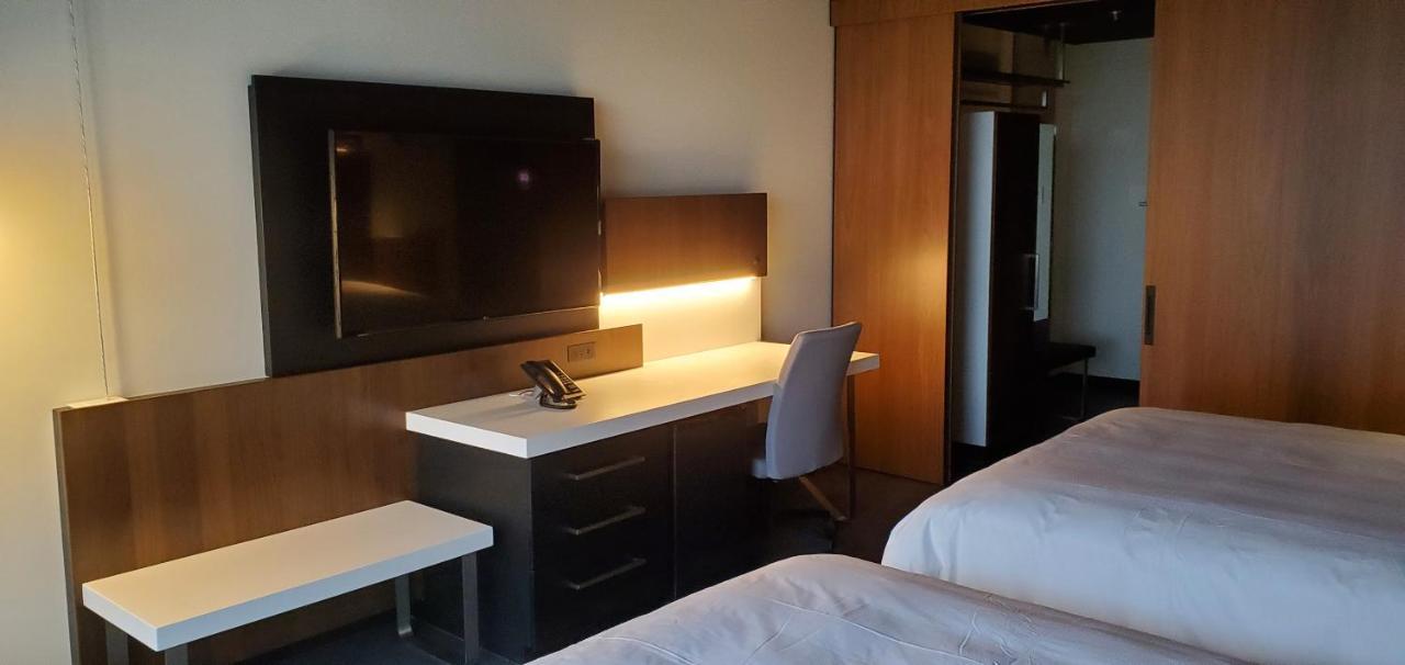 Grand Times Hotel Laval - Centropolis Buitenkant foto
