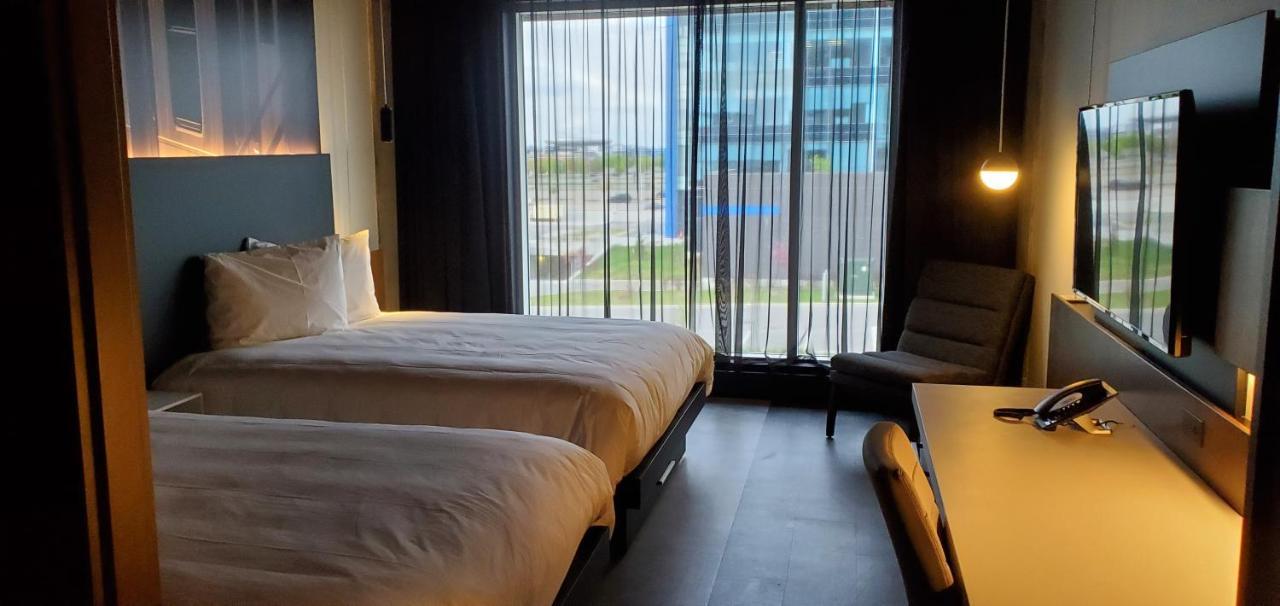 Grand Times Hotel Laval - Centropolis Buitenkant foto