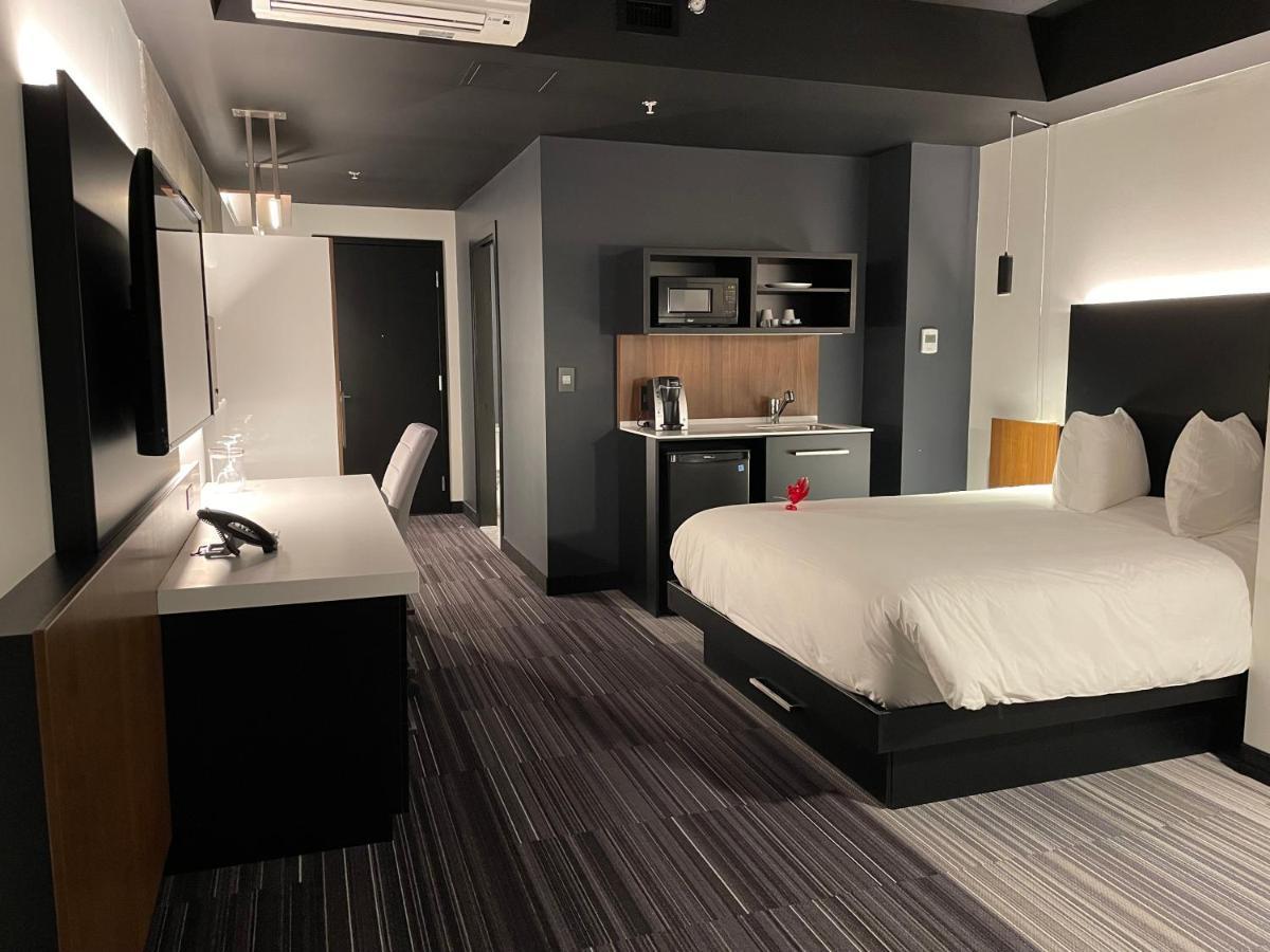 Grand Times Hotel Laval - Centropolis Buitenkant foto